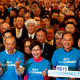 Former Chief Secretary Carrie Lam (bottom C) poses with supporters during an election campaign for the upcoming chief executive contest in Hong Kong, China February 3, 2017.